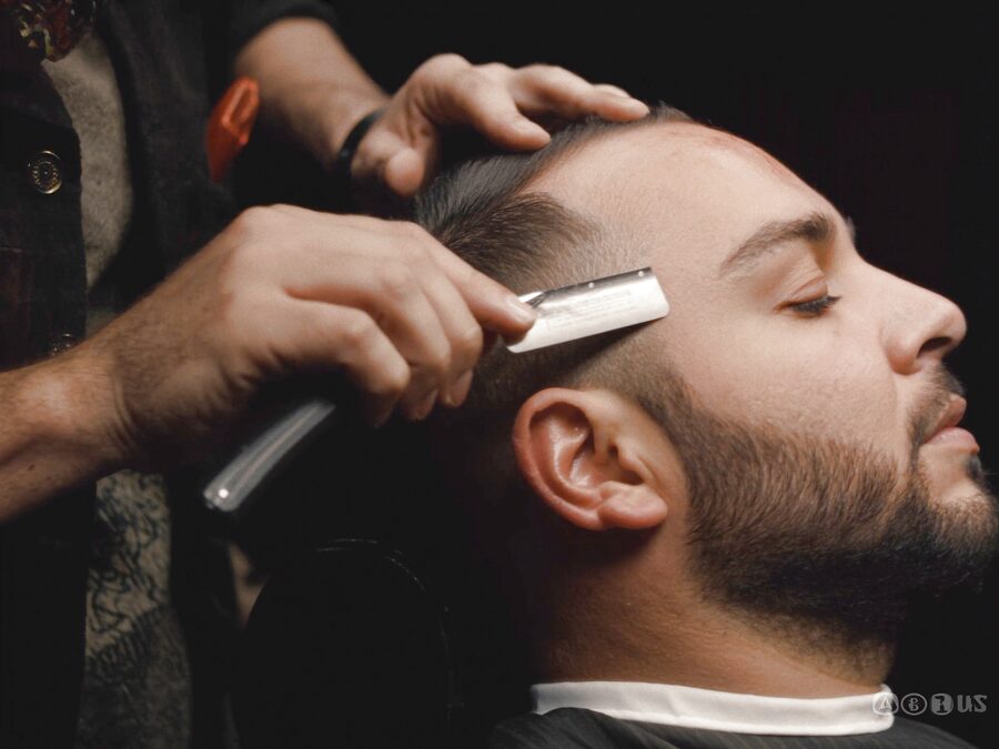 Straight-razor detail work at The Chair Barbershop in Chicago